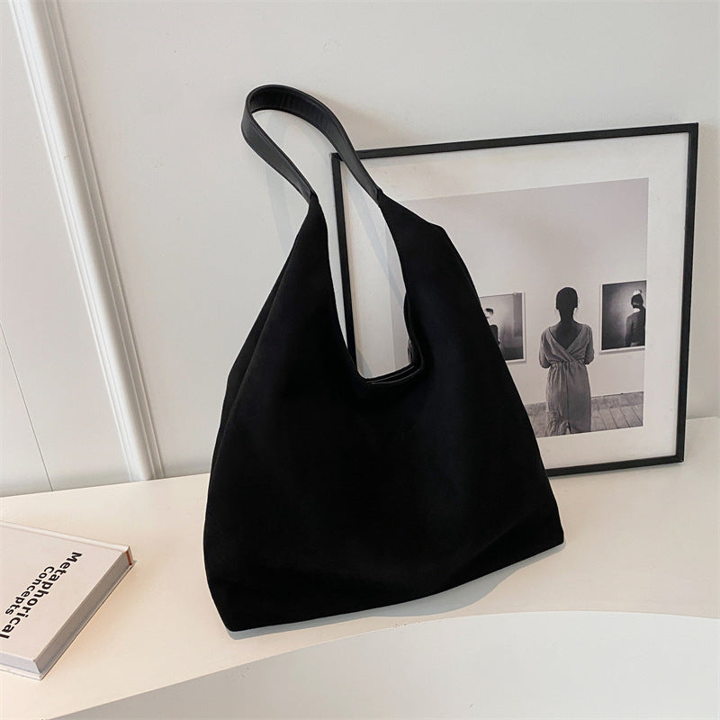 Cabas en daim Danoir Paris Sena de couleur marron clair, sac élégant avec poignées en cuir et design moderne.