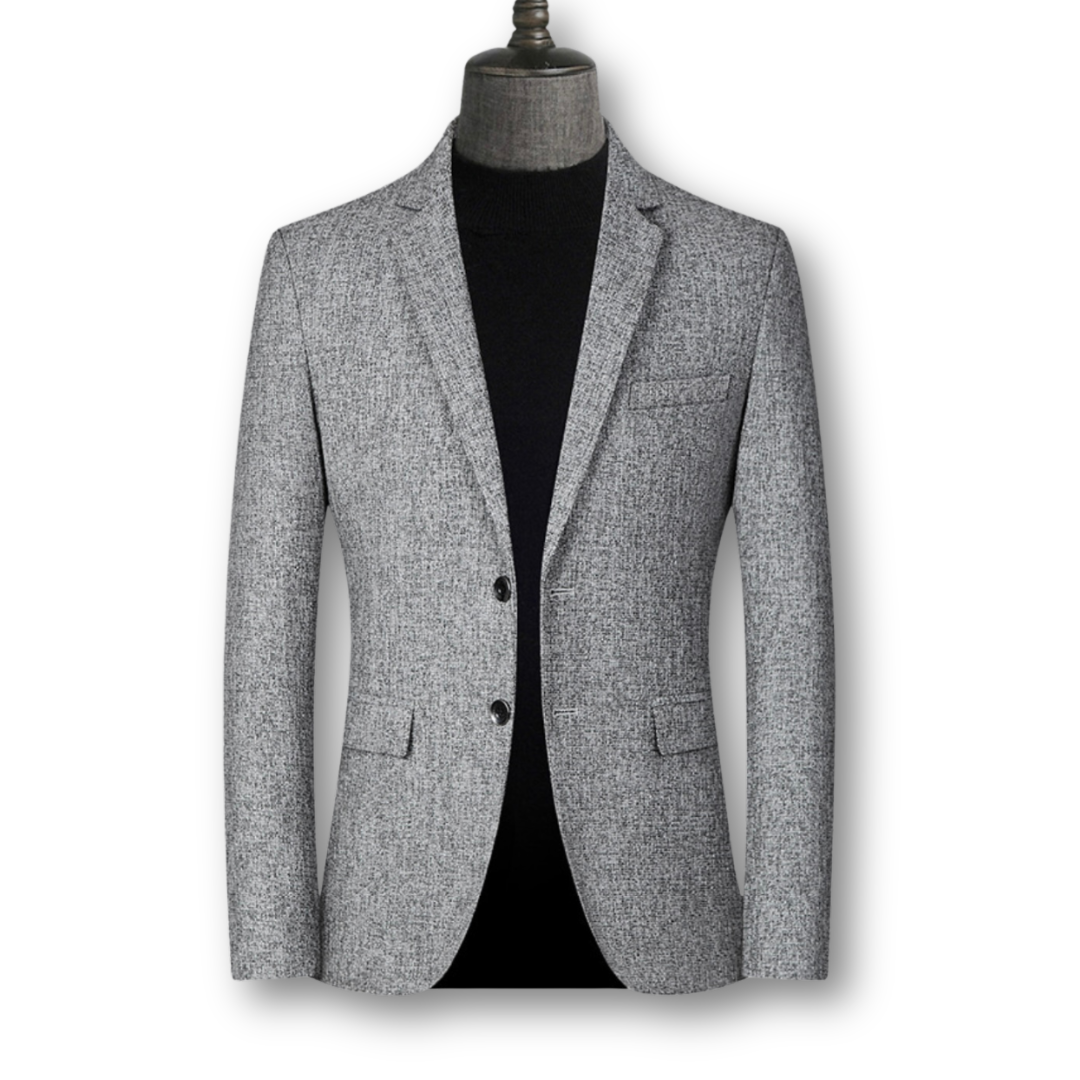 Blazer élégant en tissu écossais marron de Danoir Paris, veste sophistiquée pour un style chic et classique.