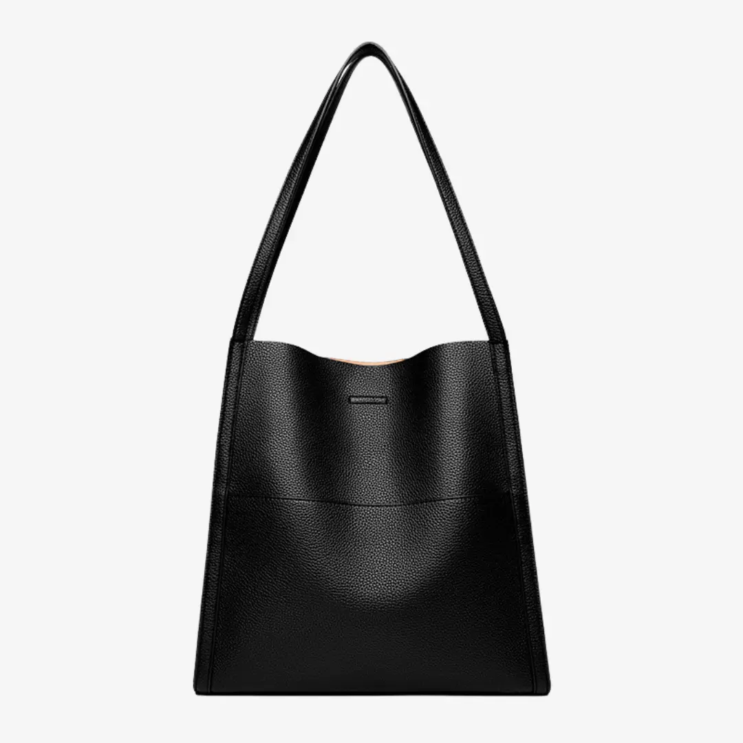 Sac à main en cuir marron Elise de Danoir Paris, élégant et spacieux, avec poignées et fermeture métallique visible.