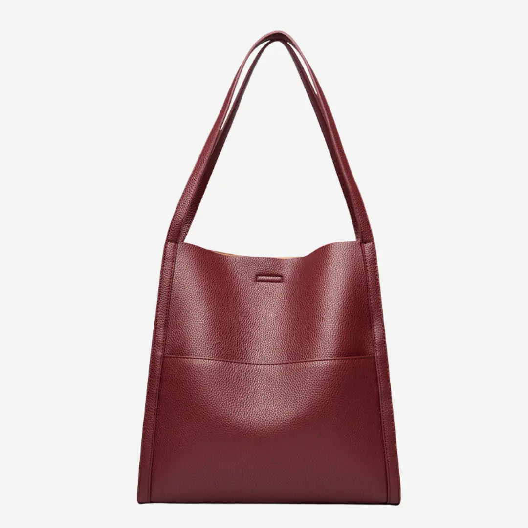Sac à main en cuir marron Elise de Danoir Paris, élégant et sophistiqué avec détails en cuir souple.