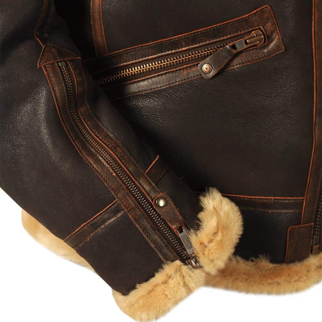 Blouson aviateur classique Danoir Paris en cuir marron foncé avec col en fourrure synthétique, style vintage et élégant.