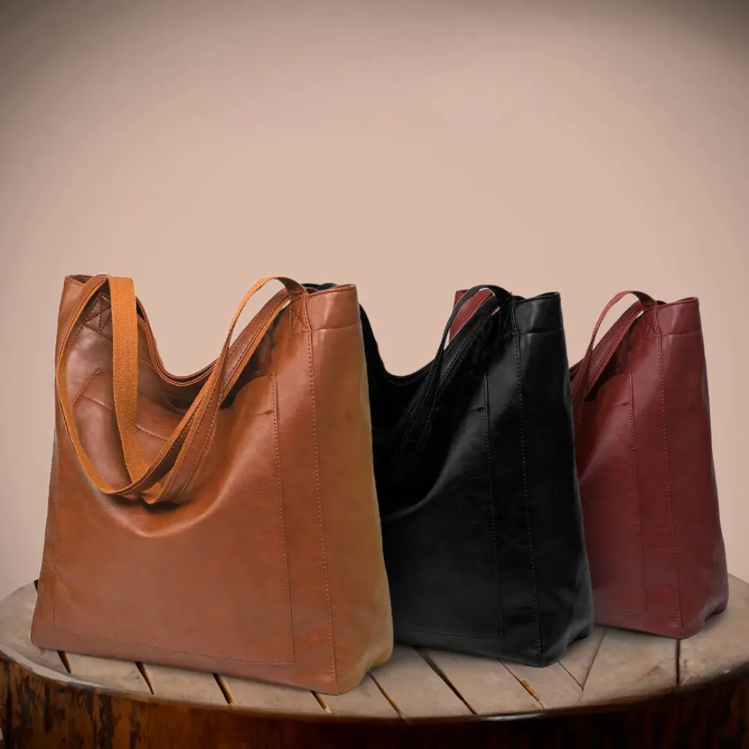 Sac de ville élégant Lila de Danoir Paris, en marron, avec poignée et design sophistiqué visible dans l'image.