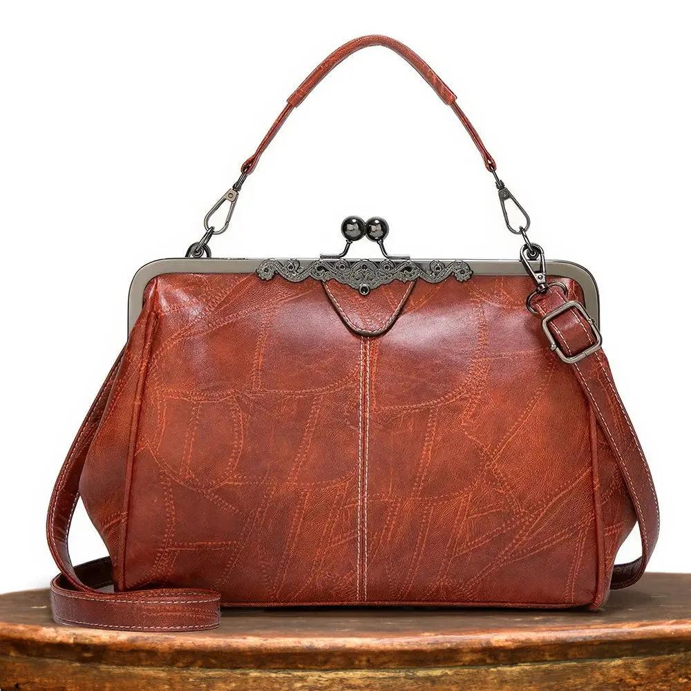 Sac à main vintage Danoir Paris Lorelei en cuir marron, élégant et intemporel, avec poignées et détails classiques.