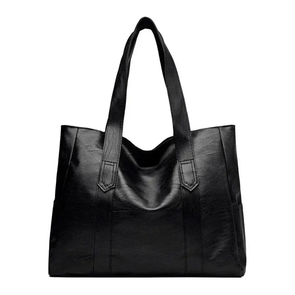 Sac à main minimaliste Danoir Paris en cuir marron, élégant et sophistiqué, idéal pour un style chic et raffiné.