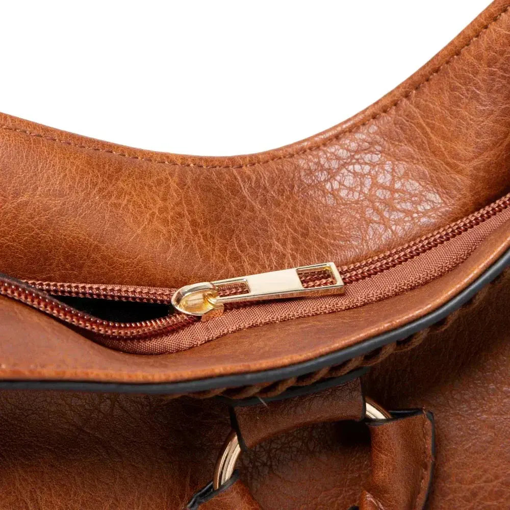 Sac à bandoulière Danoir Paris Lydia en cuir marron, élégant et intemporel, avec bandoulière réglable et finition soignée.