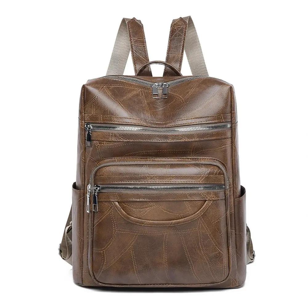 Sac à dos Marguerite de Danoir Paris en cuir marron avec détails élégants et finition chic, idéal pour un style sophistiqué.