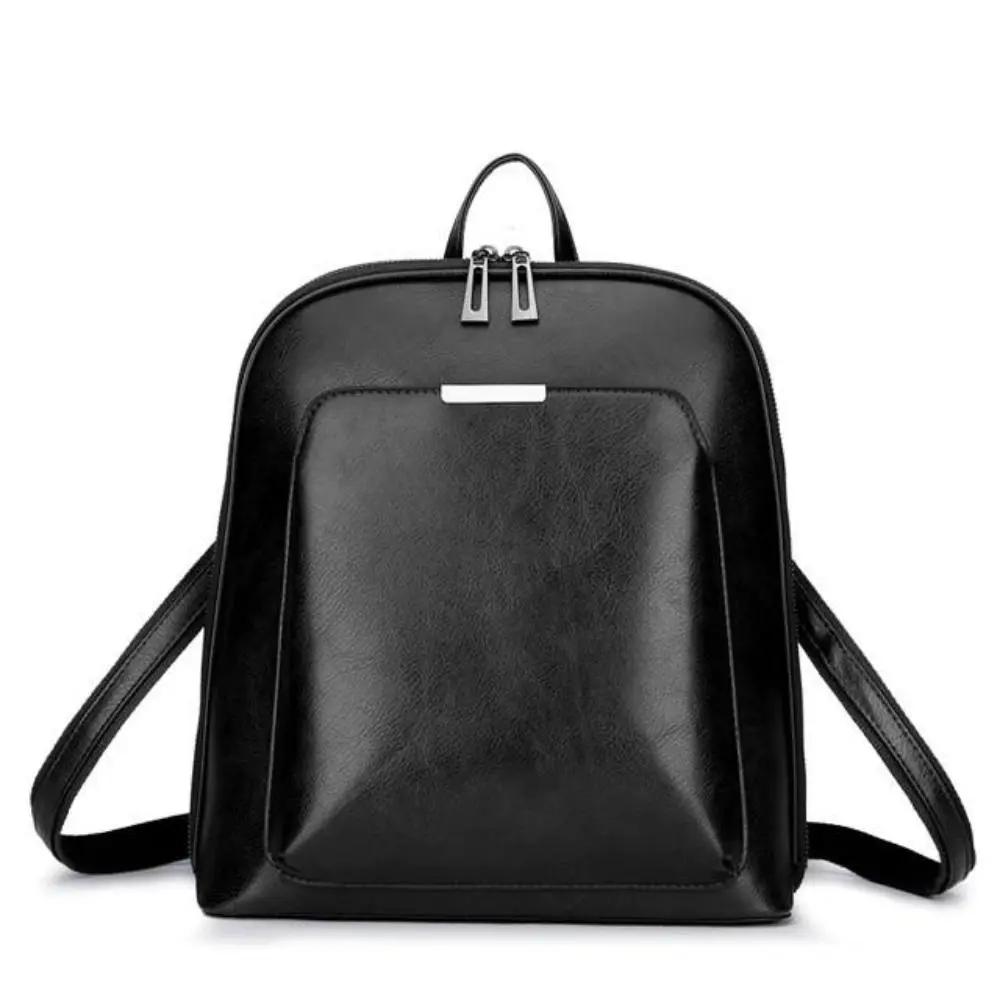 Sac à main Naomi de Danoir Paris en cuir marron avec deux zips, style intemporel et élégance simple.