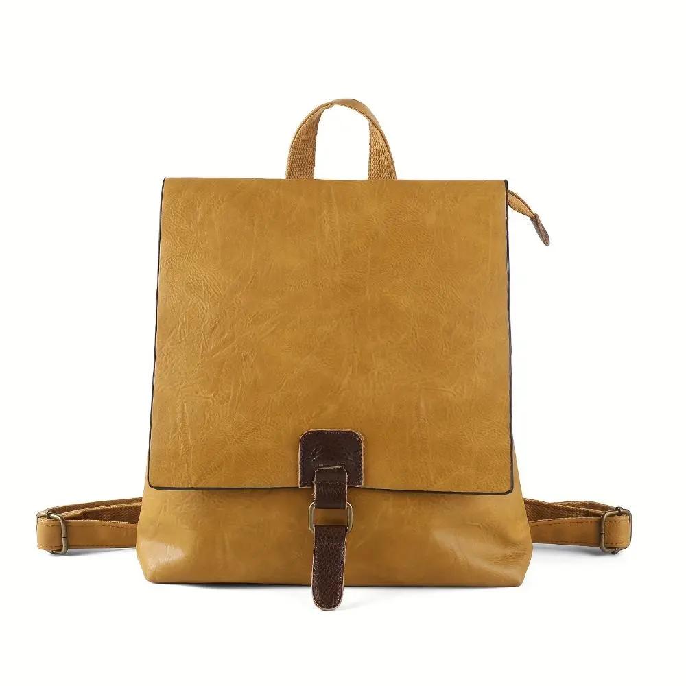 Sac à dos Danoir Paris Nina en cuir marron au style vintage, avec poches extérieures et bretelles ajustables.