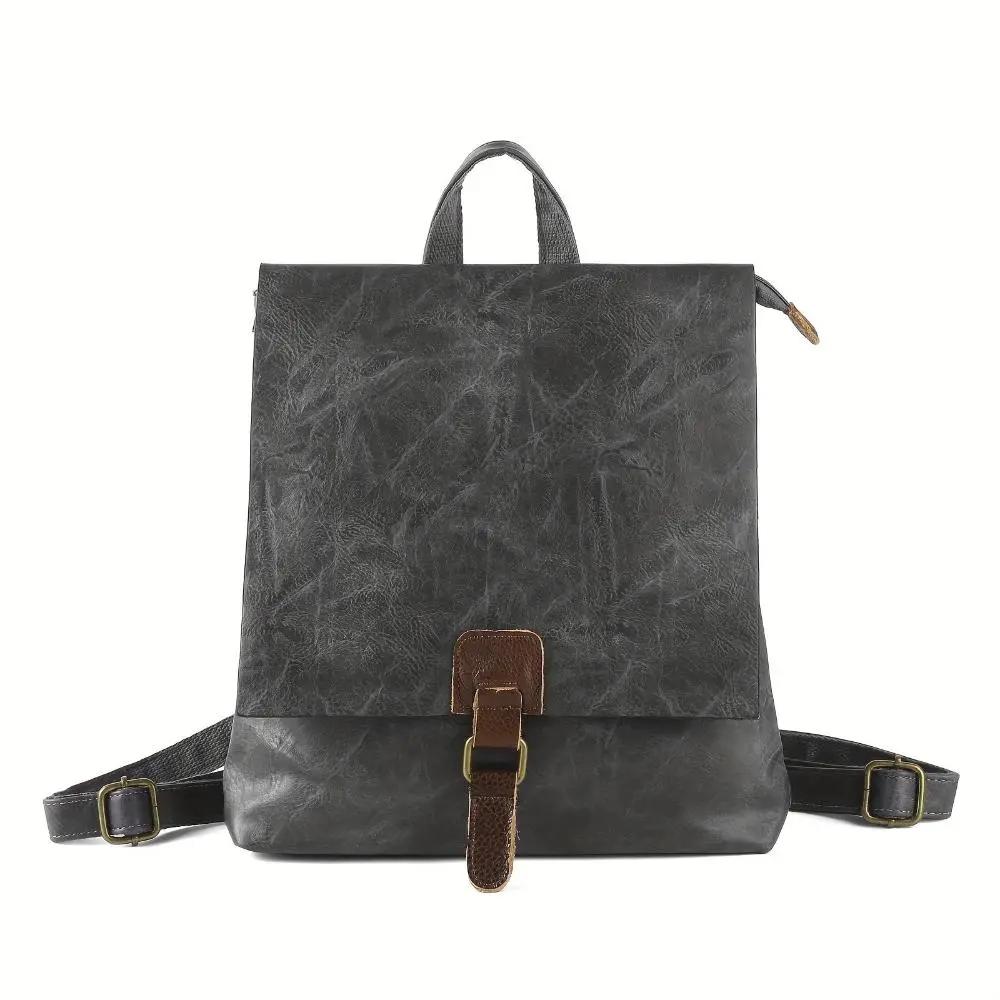 Sac à dos Danoir Paris Nina en cuir marron, style vintage, polyvalent avec poches et bretelles ajustables.