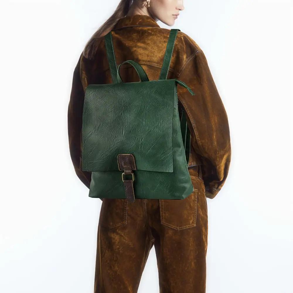 Sac à dos Danoir Paris Nina, style vintage, en cuir marron, avec poches pratiques et design élégant.