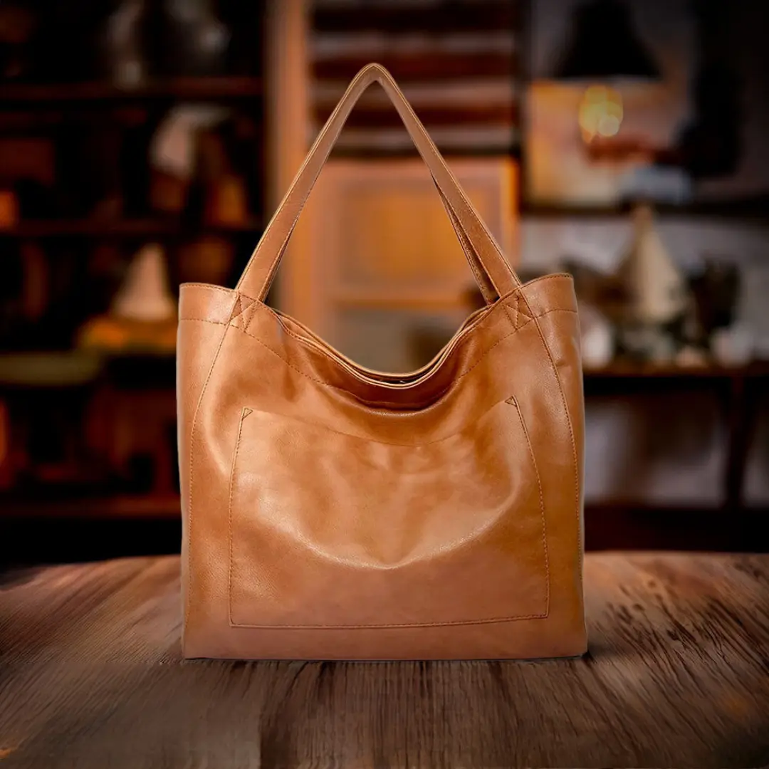 Sac à bandoulière Danoir Paris Ringelblume en matériau doux marron, sac de luxe élégant et confortable pour femmes.