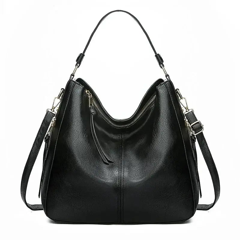 Sac élégant Romy en cuir marron de Danoir Paris, sac à main sophistiqué avec poignées et détails en cuir.