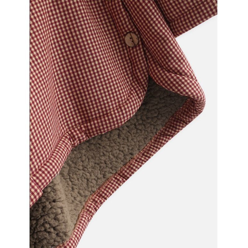 Manteau marron Sabrina de Danoir Paris, élégant et confortable, avec coupe sophistiquée et tissu chaud, porté en extérieur
