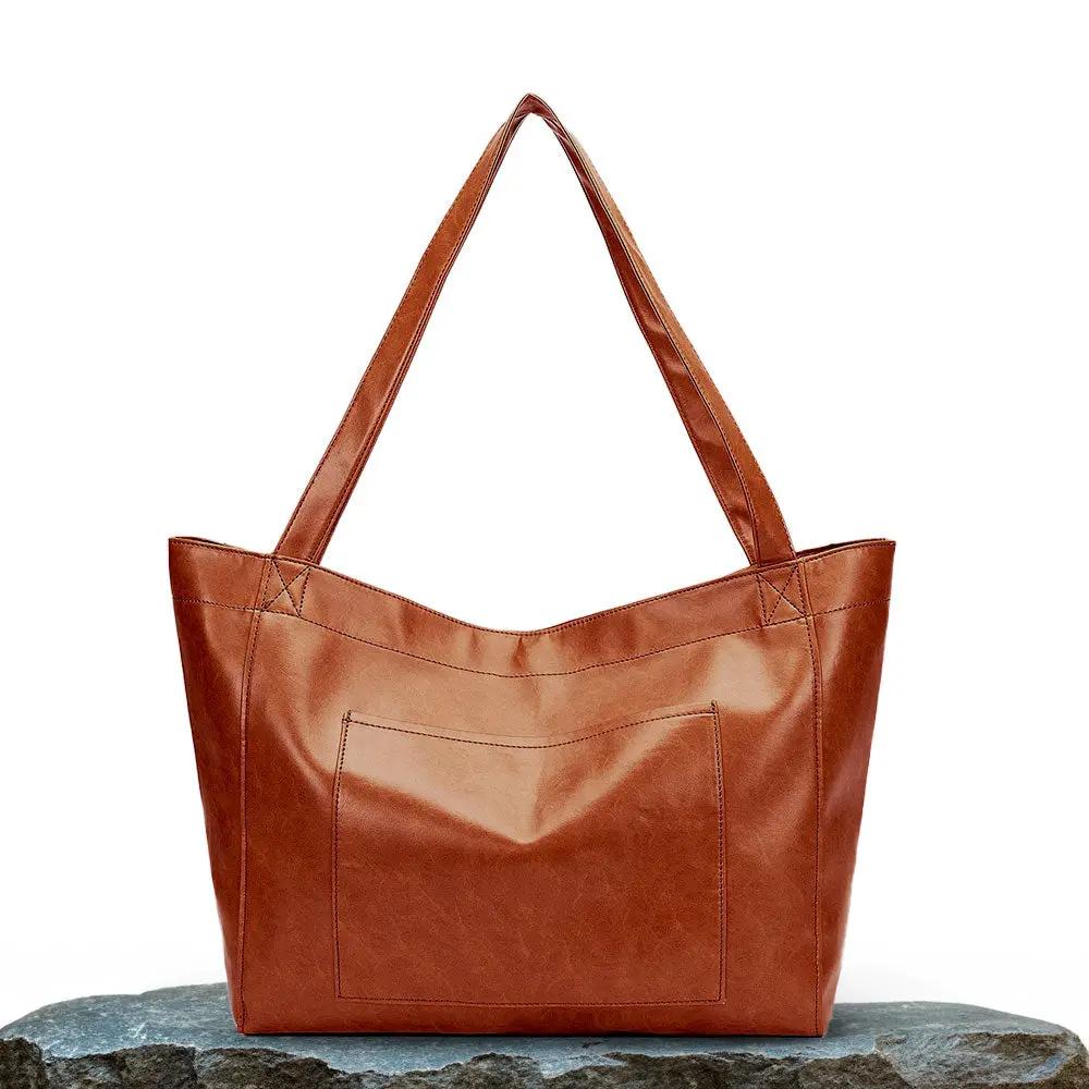 Sac à bandoulière rétro-chic Danoir Paris Seraphina en cuir marron avec détails élégants.
