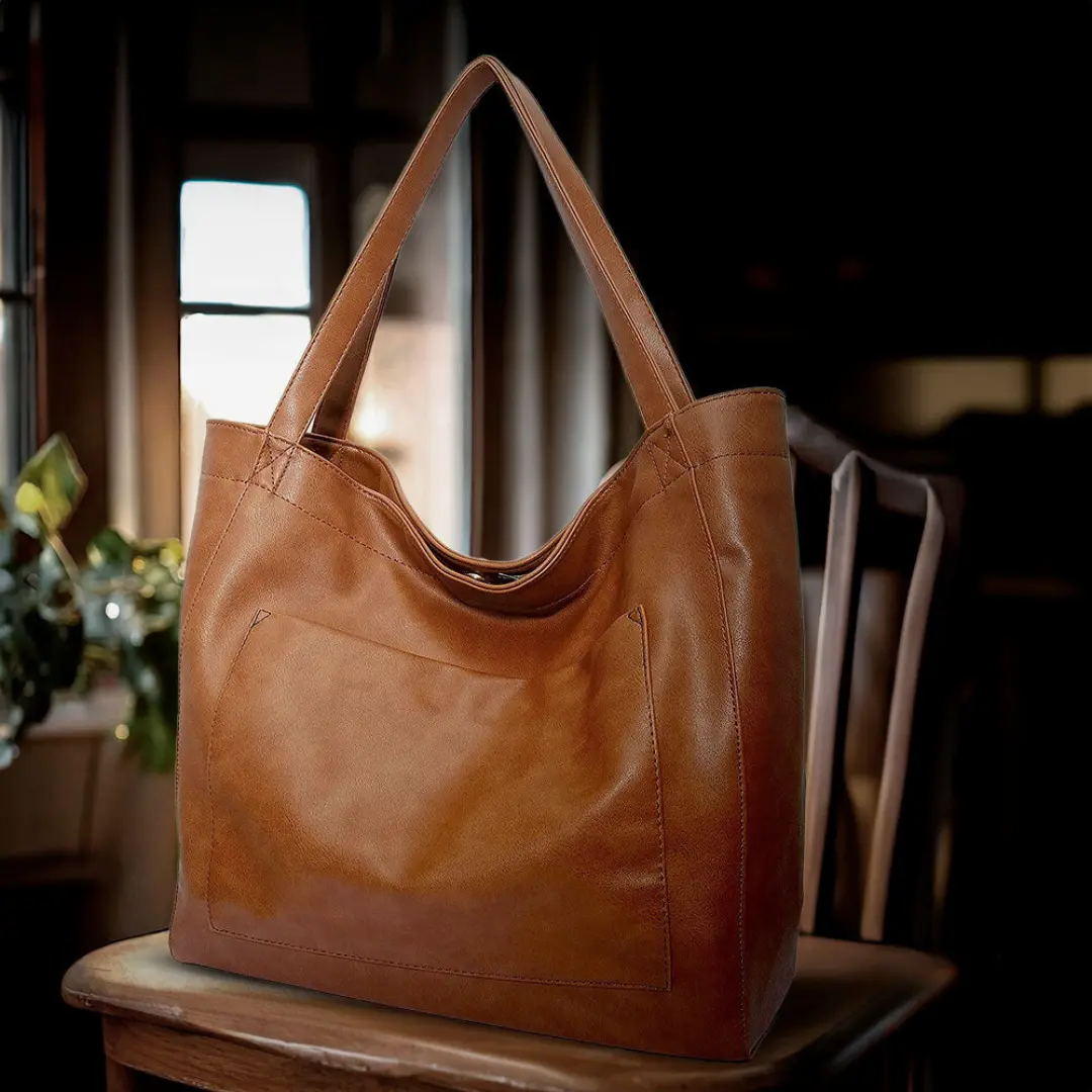 Sac à bandoulière rétro-chic Danoir Paris Seraphina en cuir marron, élégant et tendance, avec poches et détails raffinés.