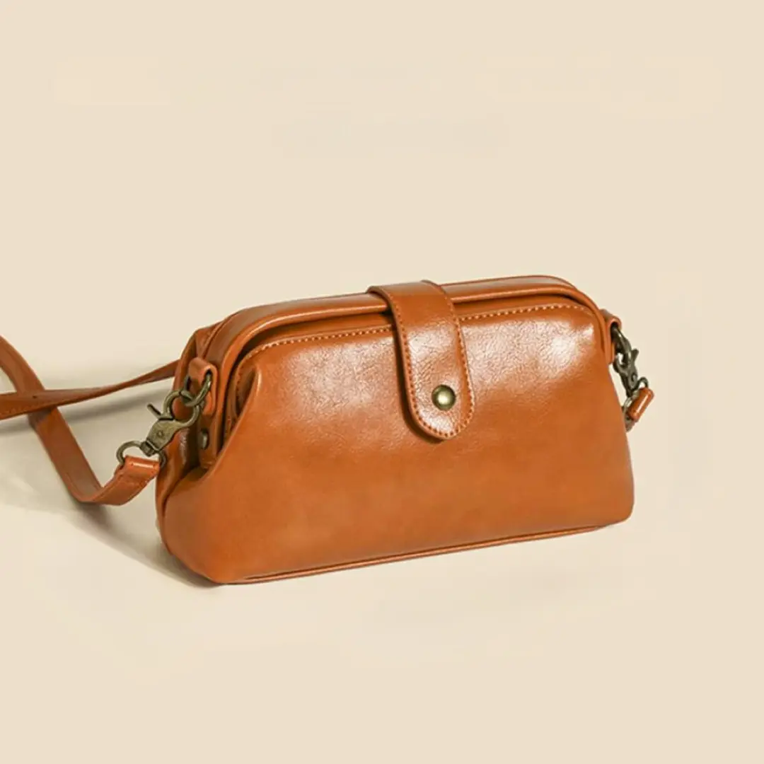Sac à main Velissa pour femmes de Danoir Paris en matériau de haute qualité, couleur marron, design élégant et durable.
