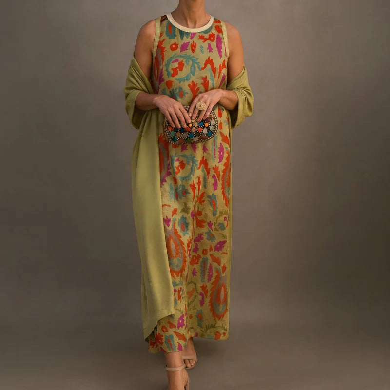 Robe longue imprimée Daniela avec gilet coordonné de Danoir Paris, tissu marron élégant et style sophistiqué.