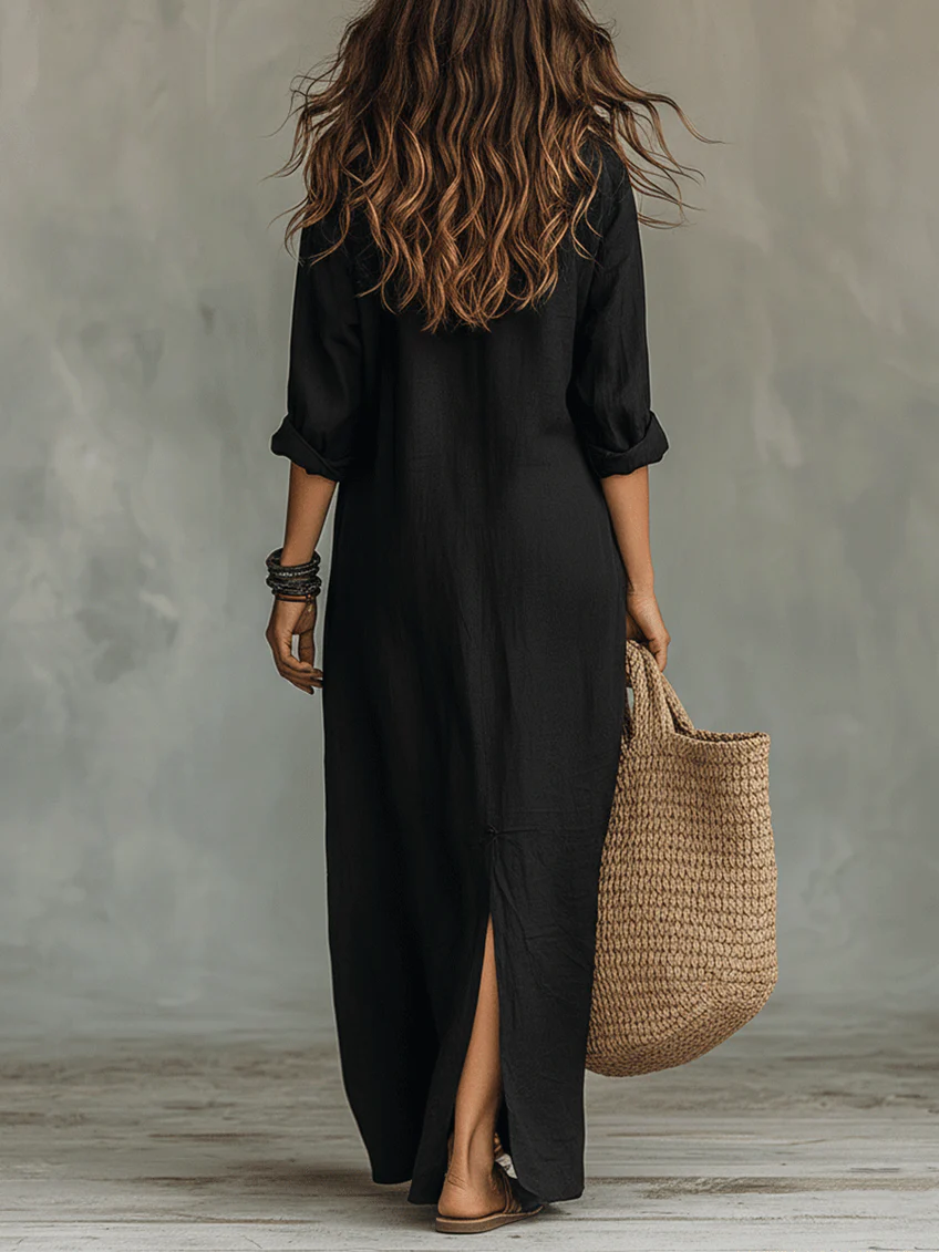 Robe longue noire Danoir Paris Soline avec boutons, style maxi dress, tissu fluide et élégance moderne.