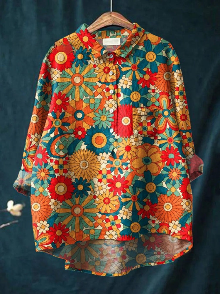 Chemise florale brodée Lina de Danoir Paris, motif coloré et vibrant, vue de face sur fond neutre.