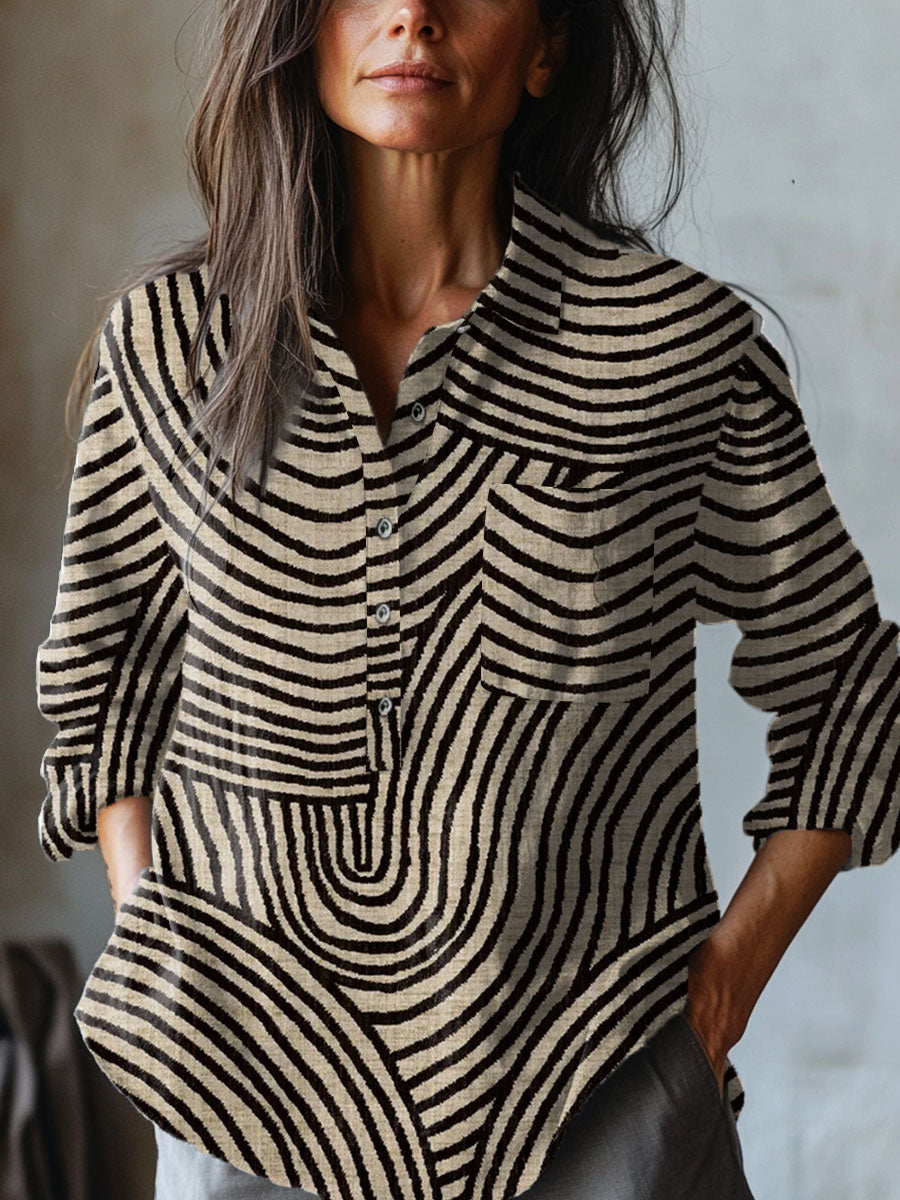 Chemise Rita de Danoir Paris avec motif abstrait rayé multicolore, coupe moderne et tissu léger pour un style tendance.