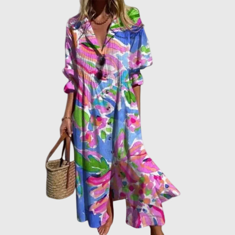 Robe maxi bohémienne élégante Zariah de Danoir Paris, motif multicolore, tissu fluide, style sophistiqué et confortable.