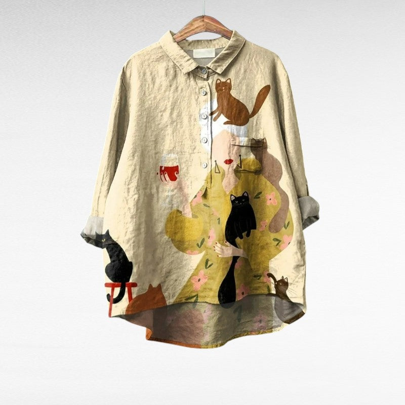 Blouse d'été élégante Ariane de Danoir Paris avec motifs multicolores, tissu léger et coupe féminine.