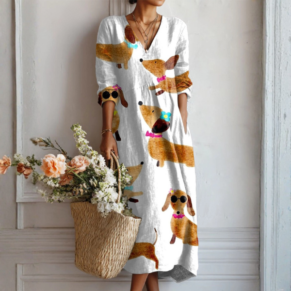 Robe Clara™ élégante sans effort de Danoir Paris avec motif multicolore, tissu fluide et coupe raffinée.