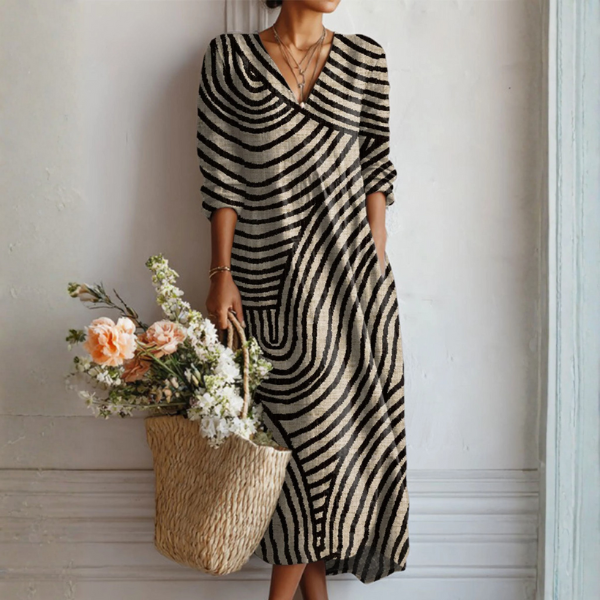 Robe vintage intemporelle Grace™ de Danoir Paris avec motif multicolore, tissu fluide et coupe élégante pour un style classique.