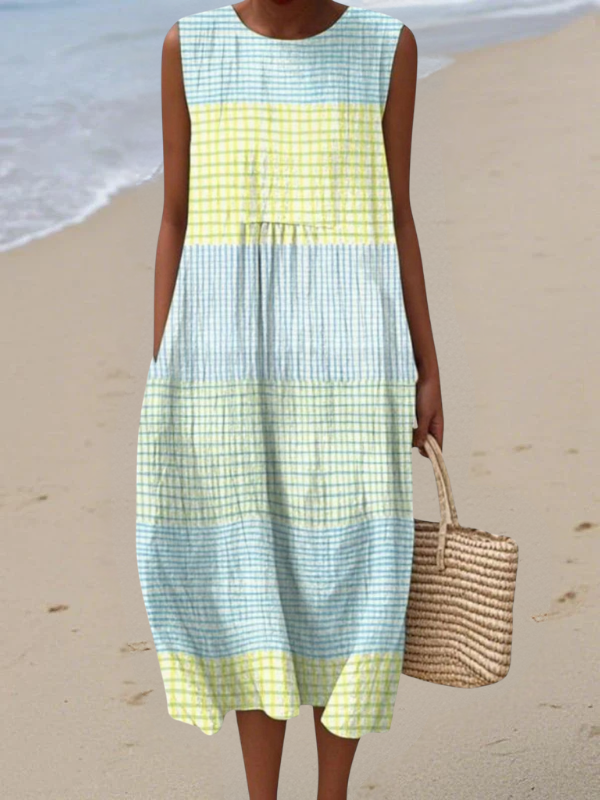 Robe d'été élégante Noa de Danoir Paris avec motif multicolore, tissu léger et coupe fluide, parfaite pour la saison estivale.