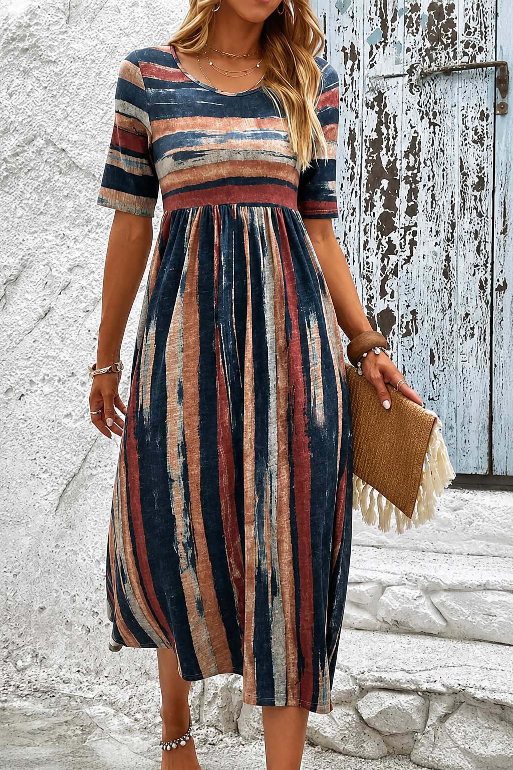 Robe midi rayée camouflage du ventre Danoir Paris, style élégant et tendance, en tissu multicolore.