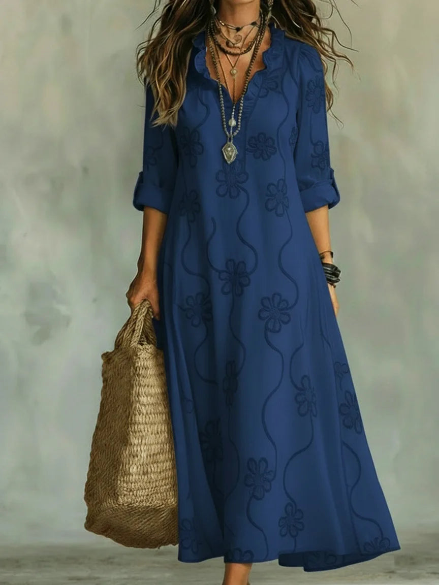 Robe d'été Sienna de Danoir Paris en tissu à fleurs, coupe fluide et élégante, idéale pour la saison estivale.