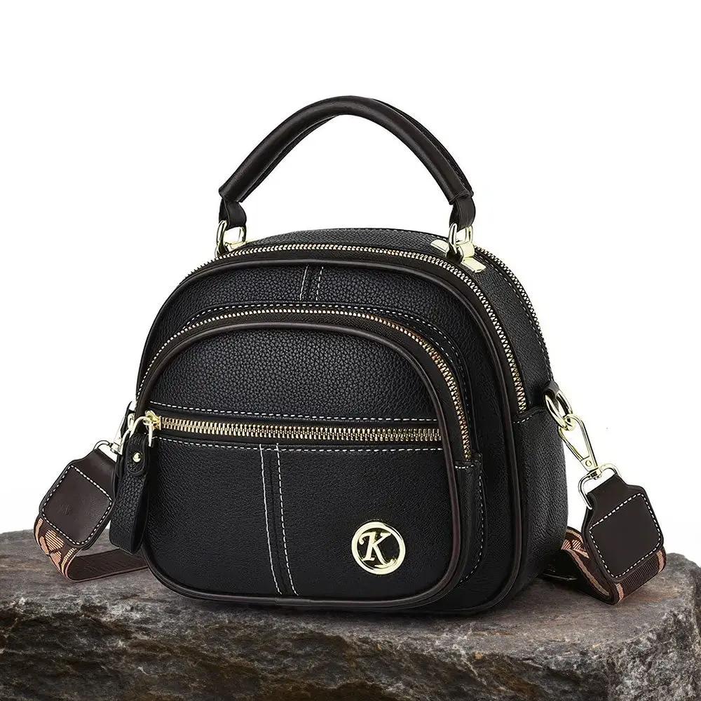 Sac à bandoulière noir Fiona de Danoir Paris, sac à main chic classique avec finition élégante et détails sophistiqués.