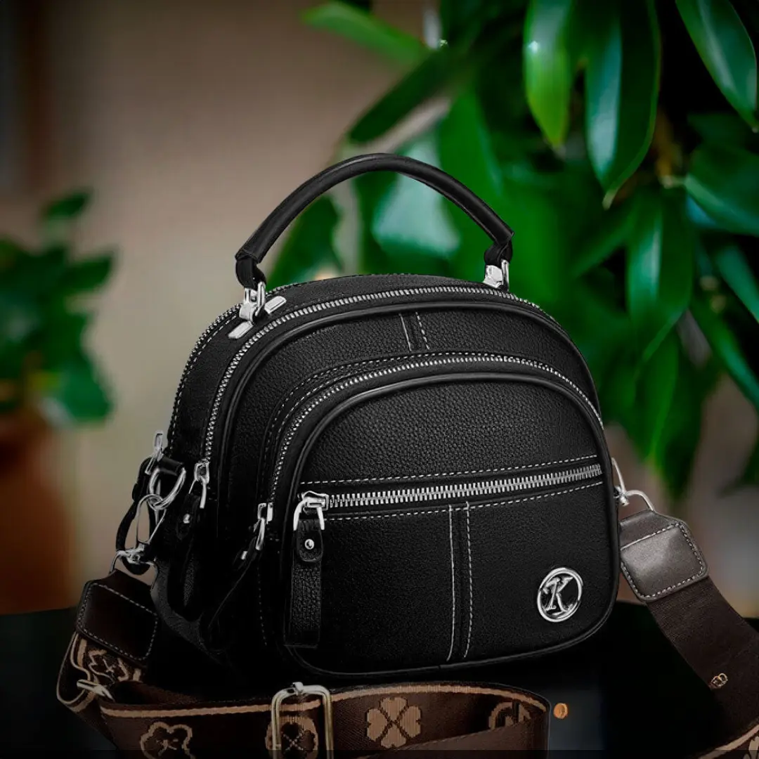 Sac à bandoulière Fiona de Danoir Paris, sac chic classique noir avec détails élégants, parfait pour une tenue sophistiquée.