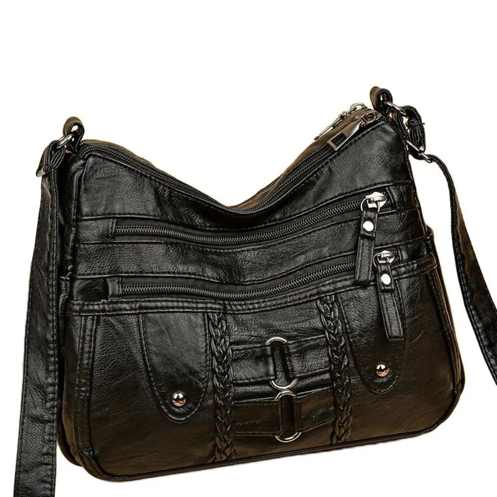 Sac bandoulière sécurisé Ivy de Danoir Paris, noir, avec fermeture robuste et design élégant pour un style pratique et sûr.