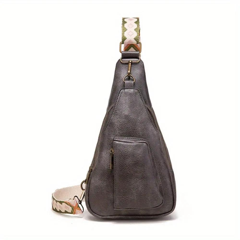 Sac à bandoulière Nina de Danoir Paris, style rétro chic, en cuir noir avec détails élégants.