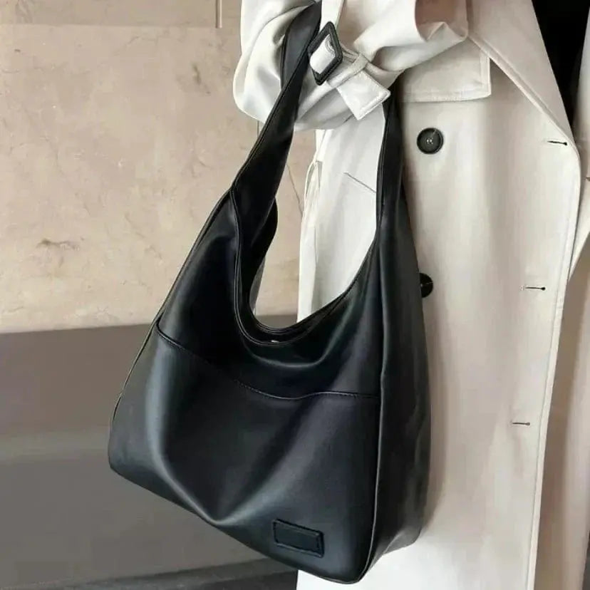 Chaussures noires Nina de Danoir Paris, style simple et intemporel pour un look quotidien élégant.