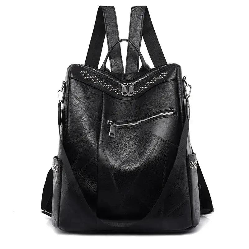 Sac à dos rétro-chic Pauline de Danoir Paris, en tissu noir avec détails élégants, vue de face.