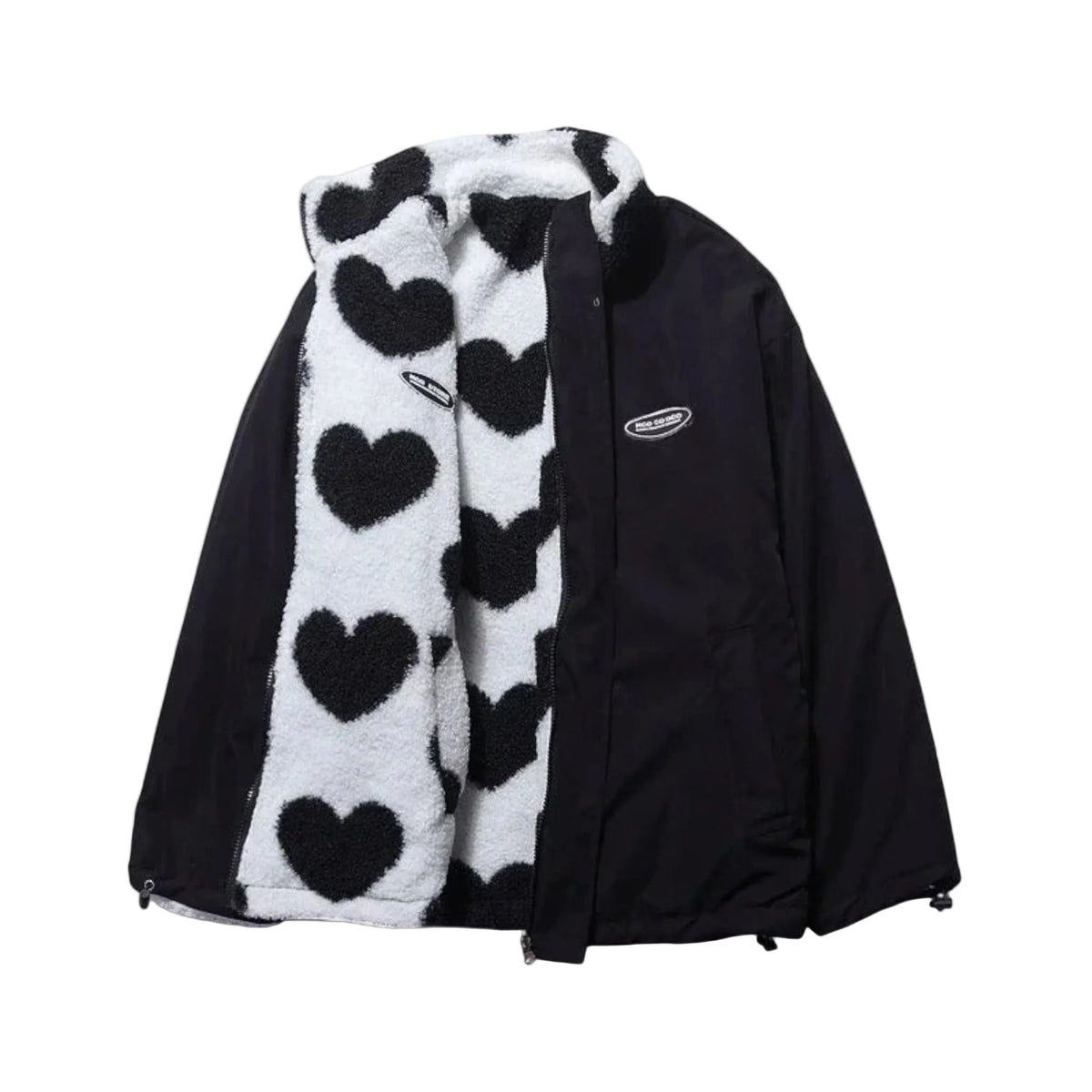 Veste réversible Amélie en forme de cœur de Danoir Paris, noir, avec design unique, portée ouverte montrant la doublure intérieure.