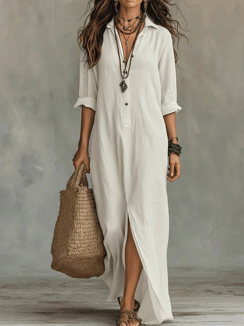Robe maxi noire ample Céline™ avec boutons, vue de face, fabriquée par Danoir Paris, en tissu fluide et élégant.