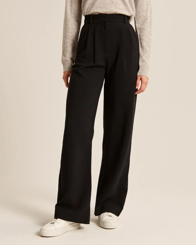 Pantalons confortables et chics Sophie de Danoir Paris en tissu noir, élégants et adaptés pour un style décontracté et sophistiqué.