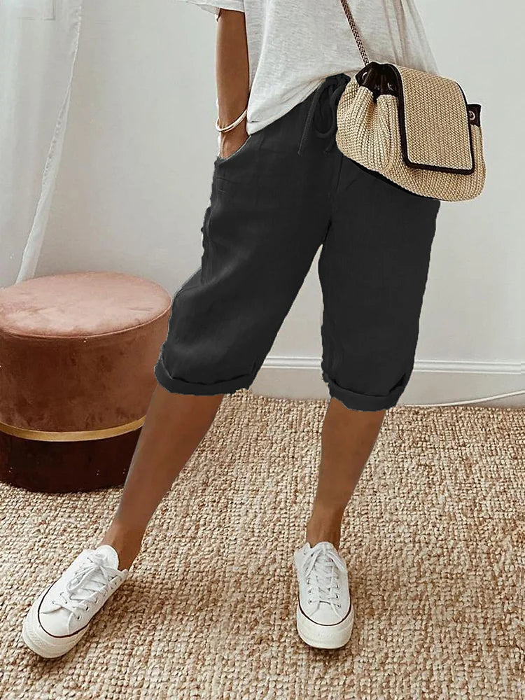Shorts en coton noir pour femmes avec motif paisley de la marque Danoir Paris, confortables et élégants.