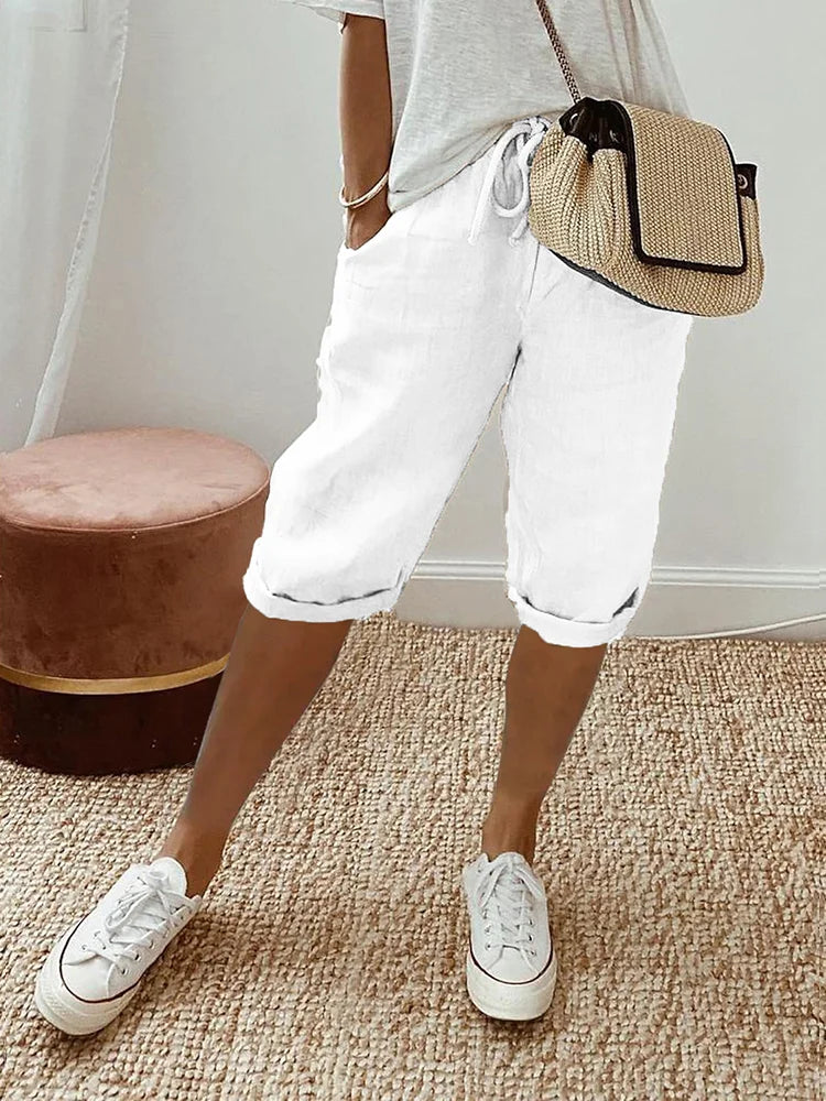 Shorts en coton noir Danoir Paris avec motif paisley pour femmes, détails visibles et confortables.