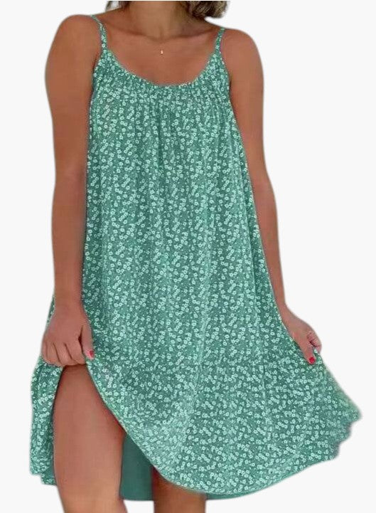 Robe légère Rosalie™ à imprimé délicat pour l'été, en tissu fluide, portée par un mannequin, de marque Danoir Paris.