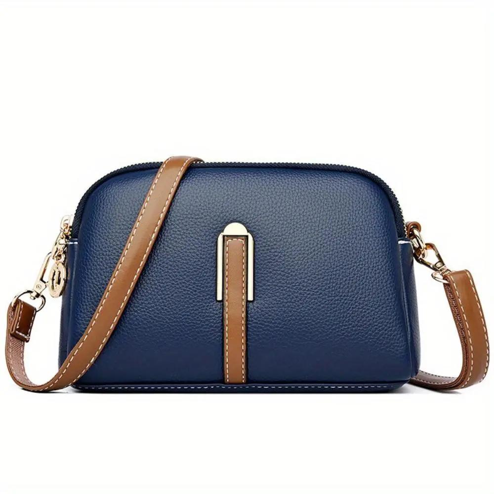 Sac bandoulière Sienna de Danoir Paris, en cuir noir, avec poignée confortable et design élégant pour un style chic.