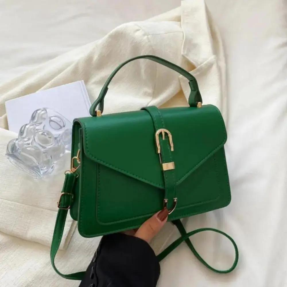 Sac à bandoulière noir Danoir Paris Tessa, sac élégant et minimaliste en cuir, avec bandoulière ajustable.