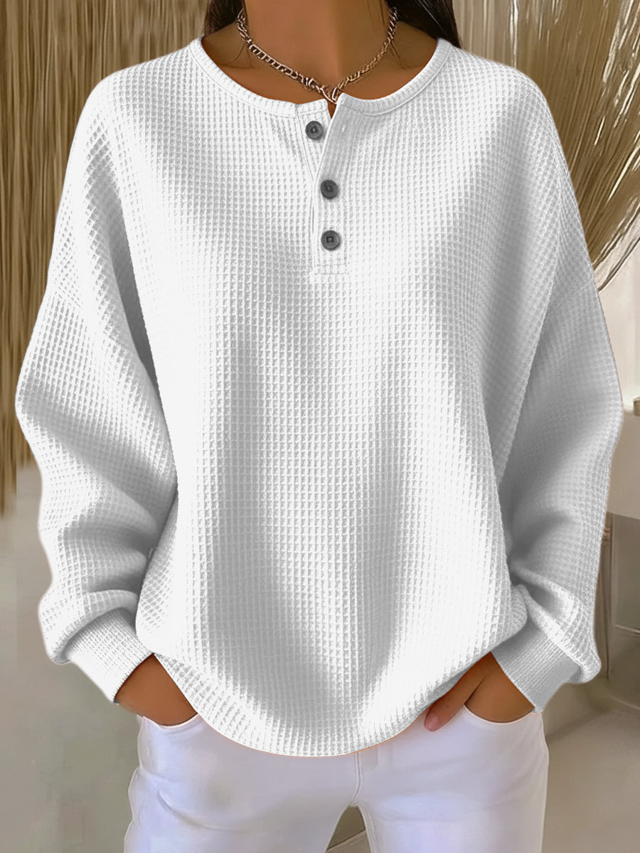 Sweatshirt Adèle™ de Danoir Paris en orange avec col élégant, douceur confortable pour un style chic et décontracté.