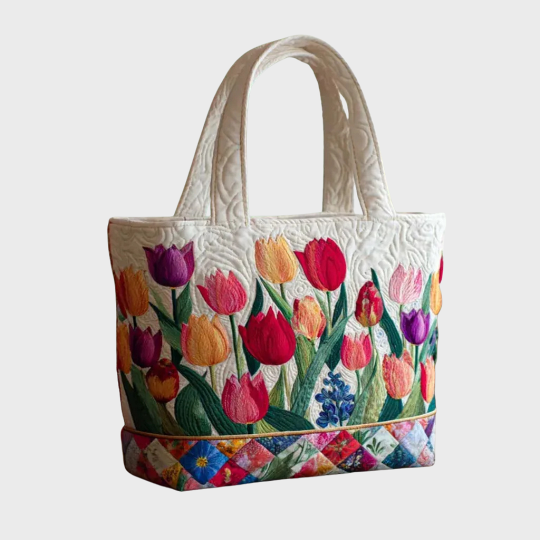 Sac à main Camilla en cuir fait main par Danoir Paris, avec une silhouette décontractée et un design élégant.