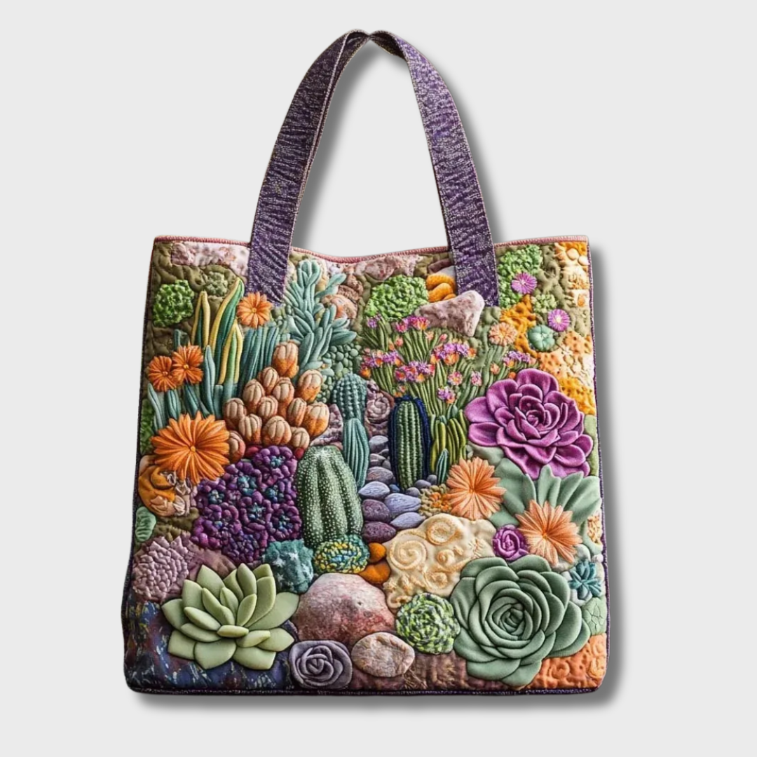 Sac à main Kinsley en cuir matelassé, fait main par Danoir Paris, avec design élégant et détails sophistiqués.