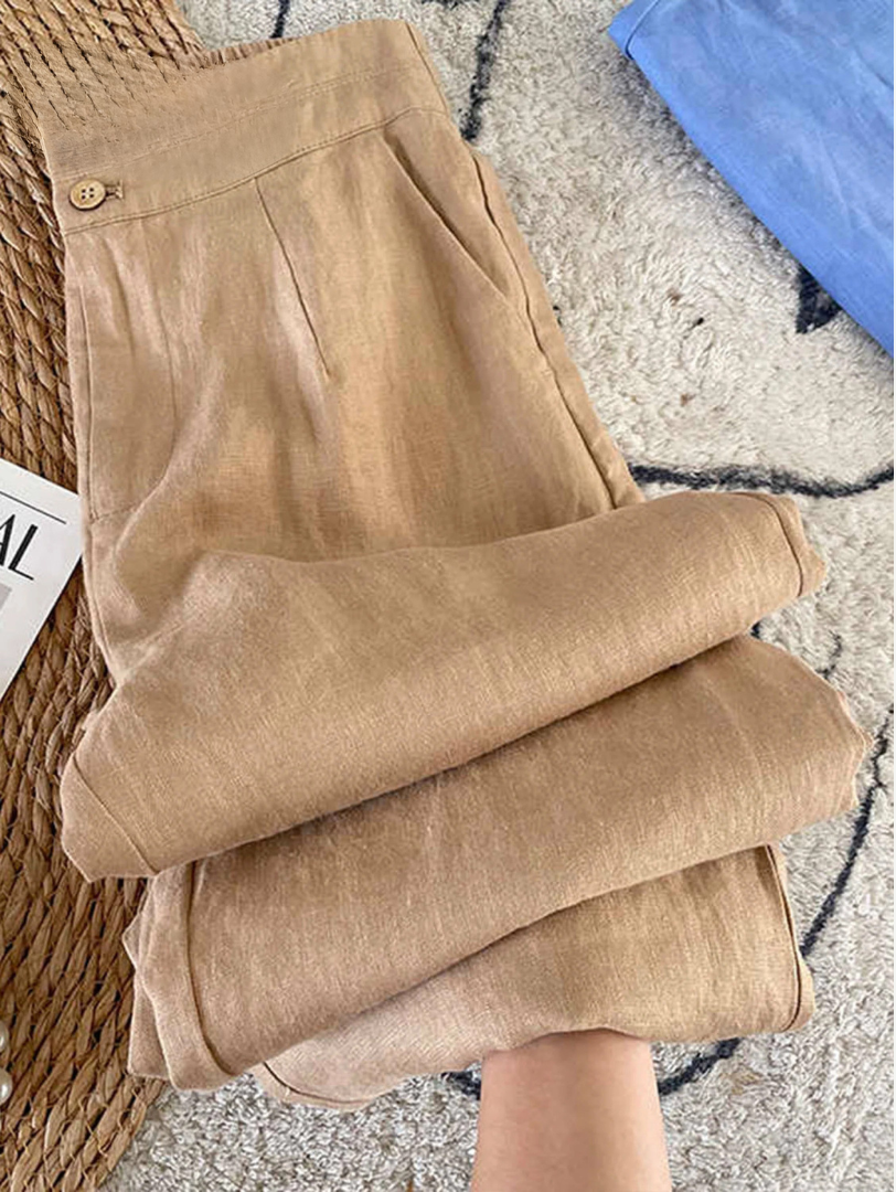 Pantalon en lin Maia de Danoir Paris, couleur abricot, pantalon hérité avec coupe élégante et tissu léger.