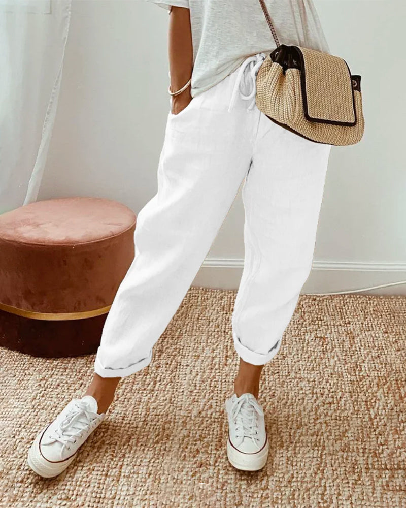 Pantalon fluide beige Lucie™ en mélange coton et lin de Danoir Paris, vue de face, tissu léger et coupe élégante.